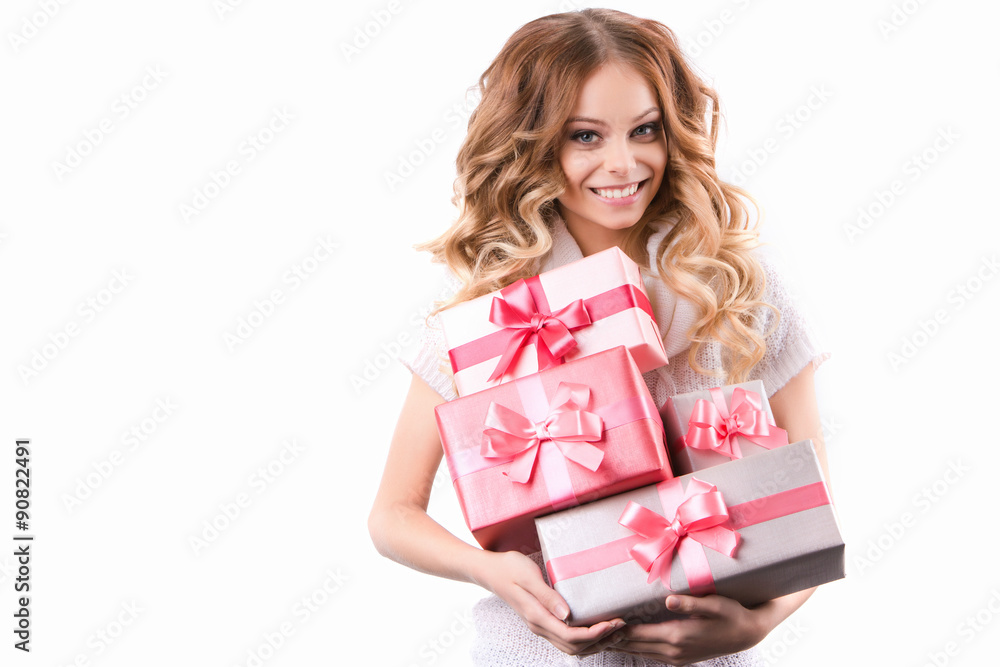 Smiling woman with curly hair holding gifts Isolated on white background. Smiling woman with curly hair holding gifts Isolated on white background.