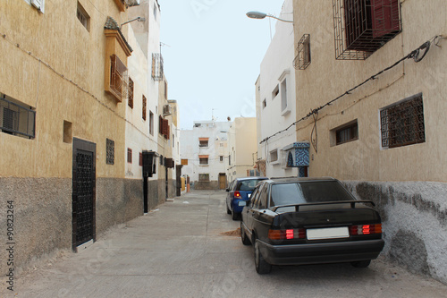 Arabian street with the parking cars on the righside of road  Agadir  Morocco.  