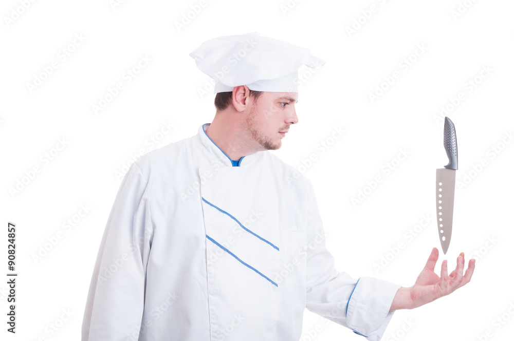 Chef with super powers holding floating knife Chef with super powers holding floating knife