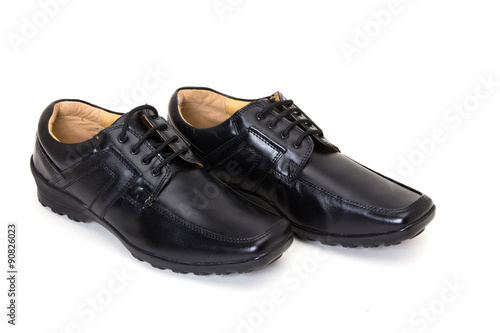 a pair of black leather shoes for men isolated on white available with clipping path