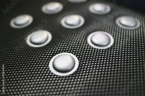 Close up of a cloth seat sports car