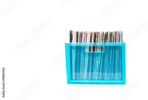 Vinyl disks in plastic boxes isolated on white