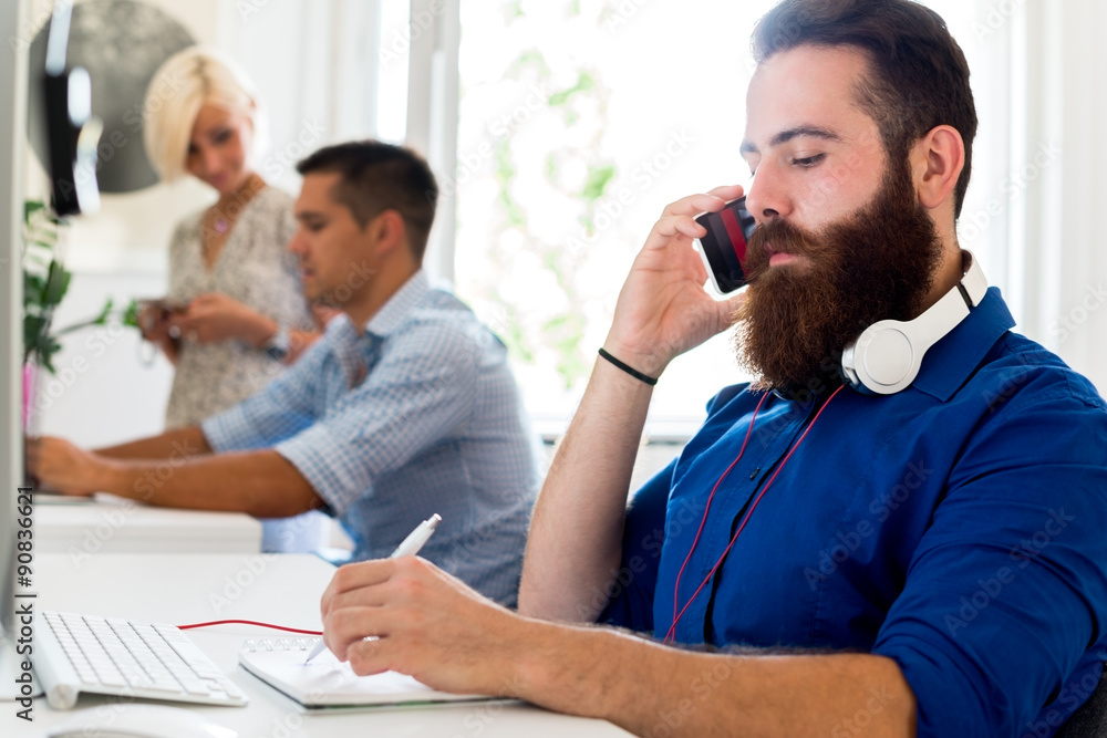Obraz premium Young Man Talking on the Phone