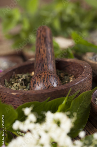 Natural remedy, mortar and herbs