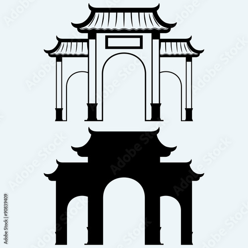 Ancient Chinese gate. Isolated on blue background