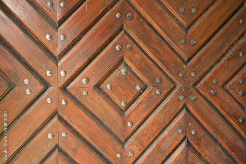 Rustic brown wooden door texture