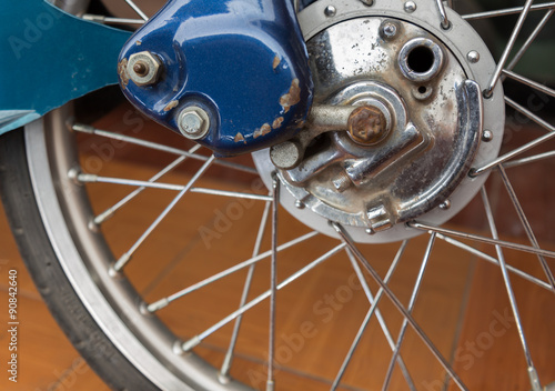 A part of classic motorcycle wheel. photo