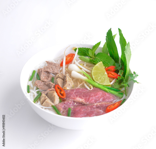 Traditional Vietnamese beef soup pho on white background