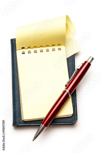 Yellow blank notepad with pen