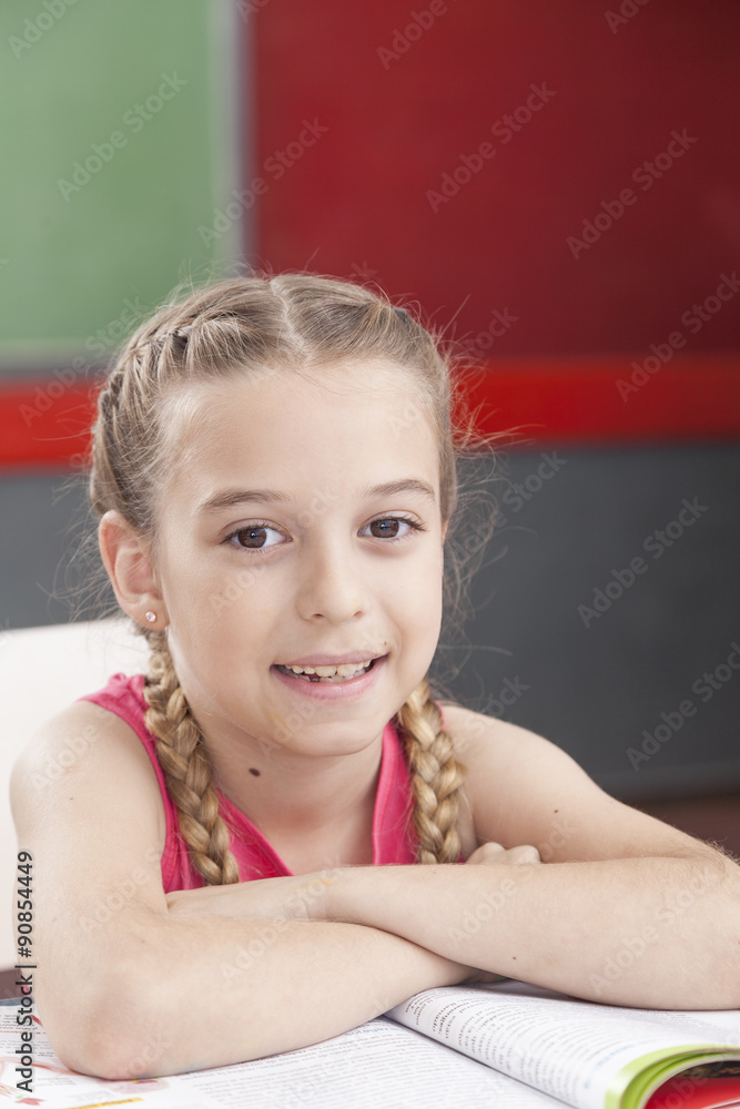 Girl smiling and looking at camera Girl smiling and looking at camera