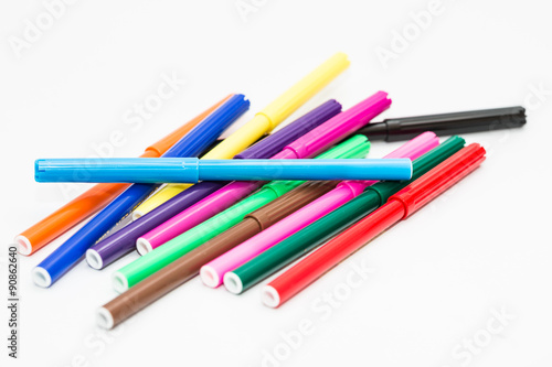 Color magic pen marker on white background.