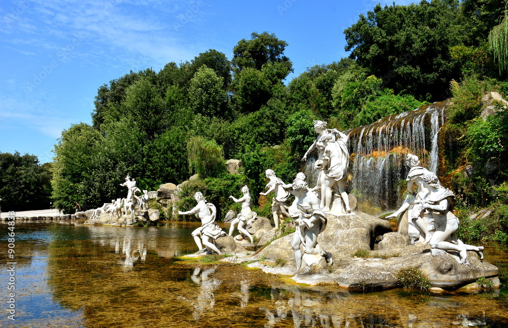 The baroque residence of Caserta in Italy, the lake, the statues.