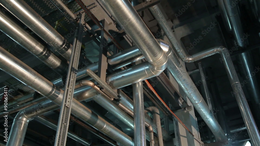 Metal Circular Tanks in Manufacturing of Vegetable Oils. The Shop Inside Metal Circular Tanks in Manufacturing of Vegetable Oils. The Shop Inside