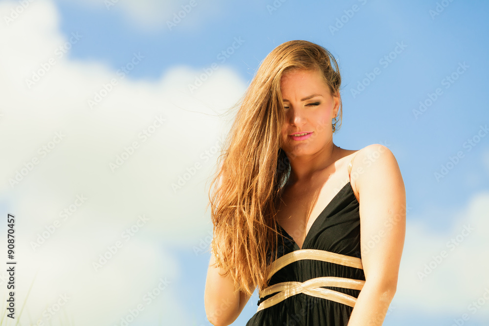 Woman standing on beach. Woman standing on beach.