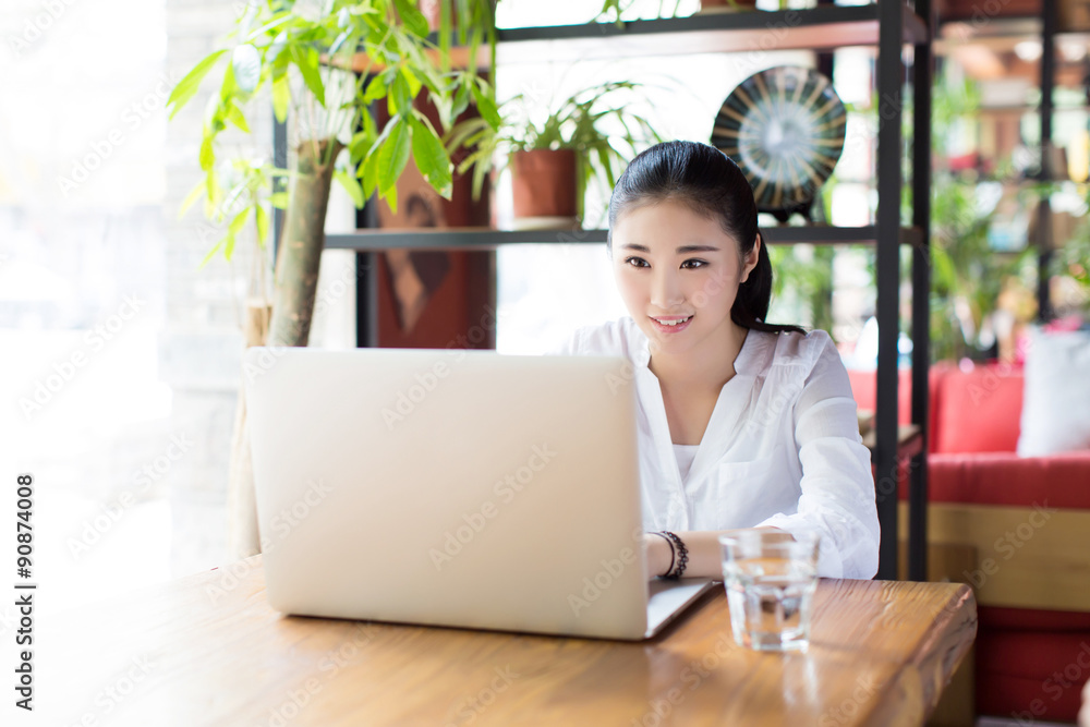 beautiful hipster woman using laptop at cafe beautiful hipster woman using laptop at cafe