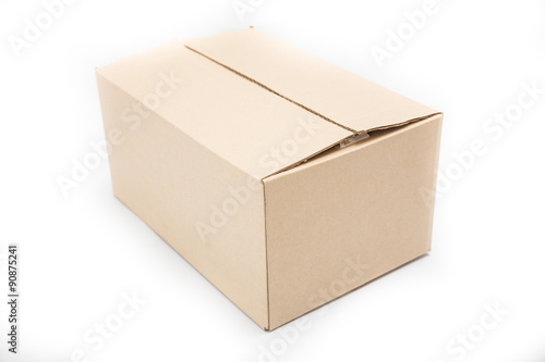 Empty brown paper box on white background © pushish images