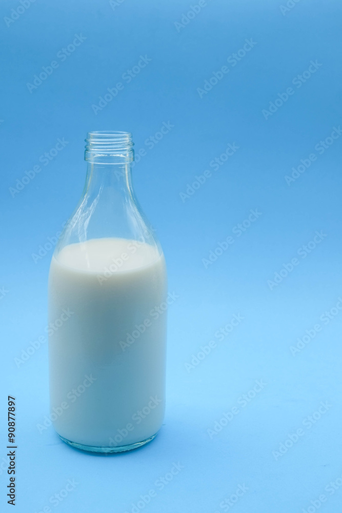with milk on blue background with milk on blue background