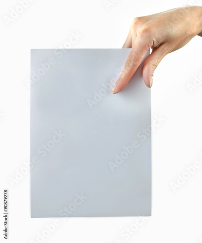 Female hand holding paper blank isolated on white