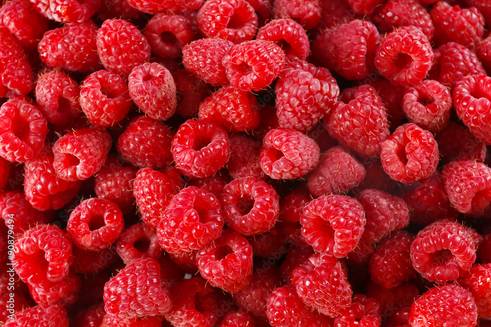 Heap of sweet red raspberries close up Heap of sweet red raspberries close up