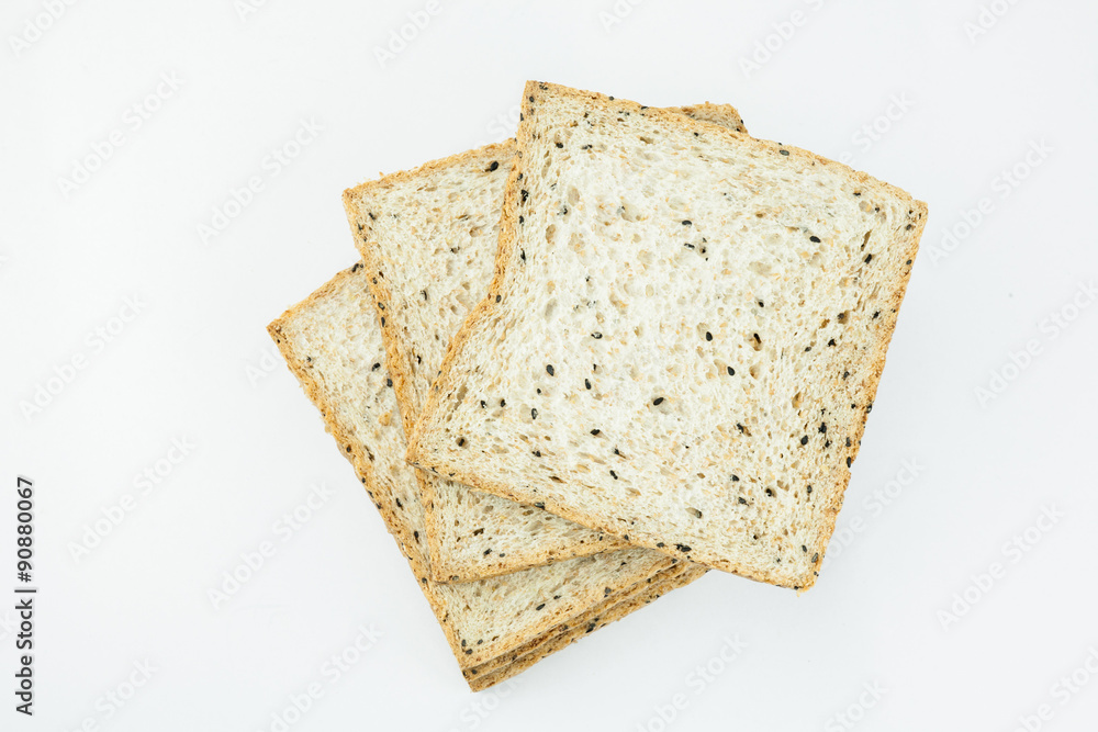Fresh sliced wholewheat bread with various seeds and multigrain on isolated white background Fresh sliced wholewheat bread with various seeds and multigrain on isolated white background