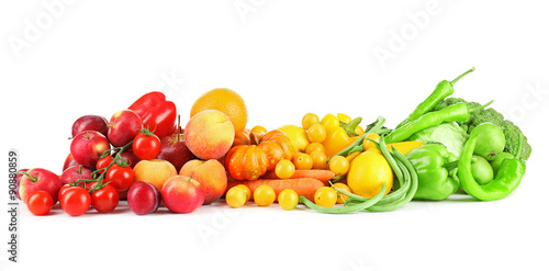 Heap of fresh fruits and vegetables  isolated on white