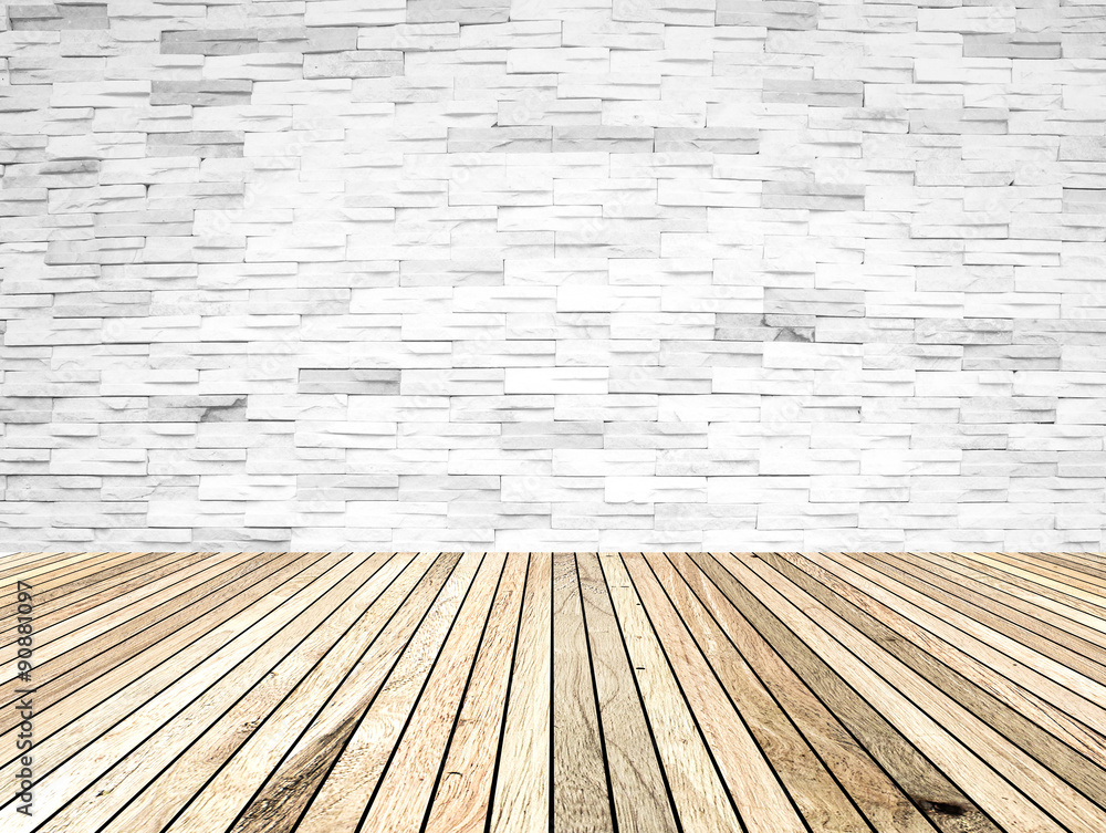 perspective wood plank floor with over blur Brick wall backgroun