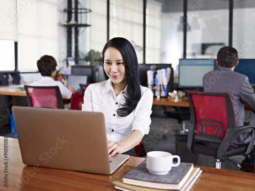 asian business woman working in office photo