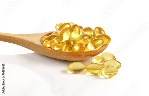 Cod liver oil omega 3 gel capsules isolated on white background photo