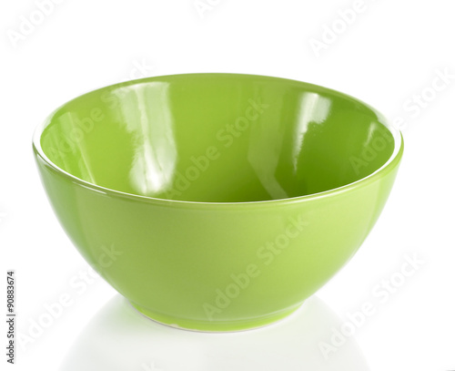 Empty green plastic bowl isolated on white background photo