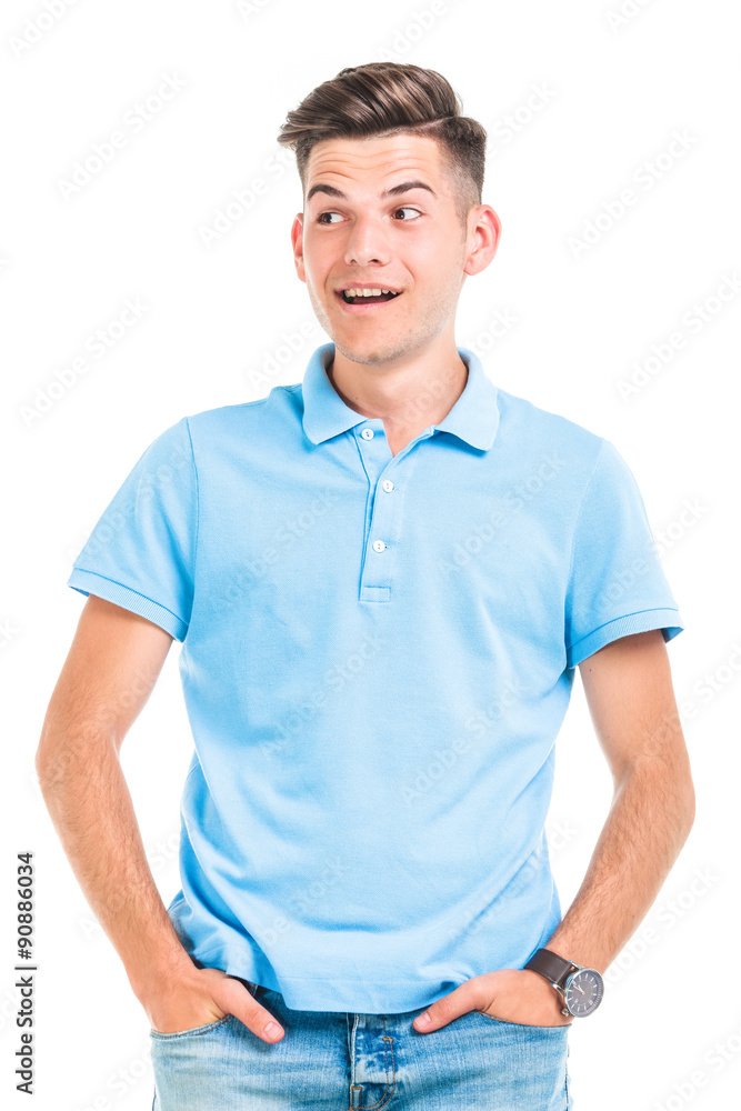 Young casual man smiling away from the camera Young casual man smiling away from the camera