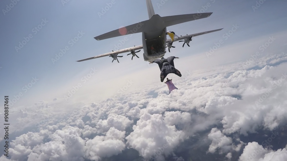 Obraz premium Wingsuit exit from c130J hercules