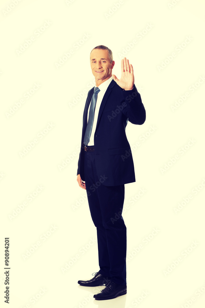 Businessman pressing abstract screen Businessman pressing abstract screen
