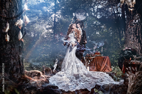 Woman model bride in a mystical forest.