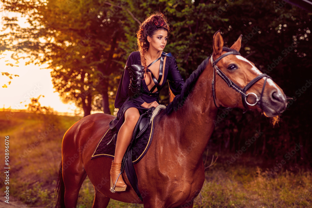 Obraz premium Fashion model with horse