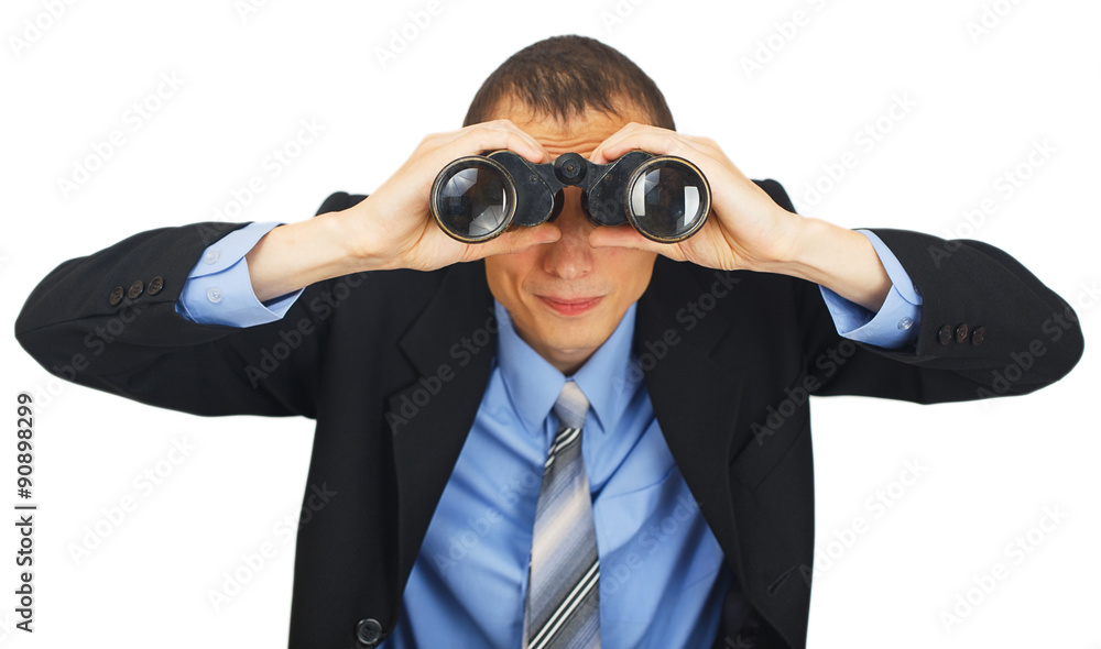 Business man wearing suit with blue tie with binoculars Business man wearing suit with blue tie with binoculars