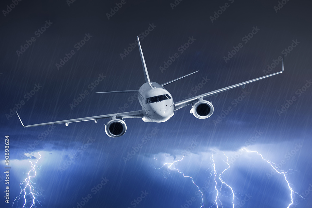 Passenger airplane on thunderstorm Passenger airplane on thunderstorm