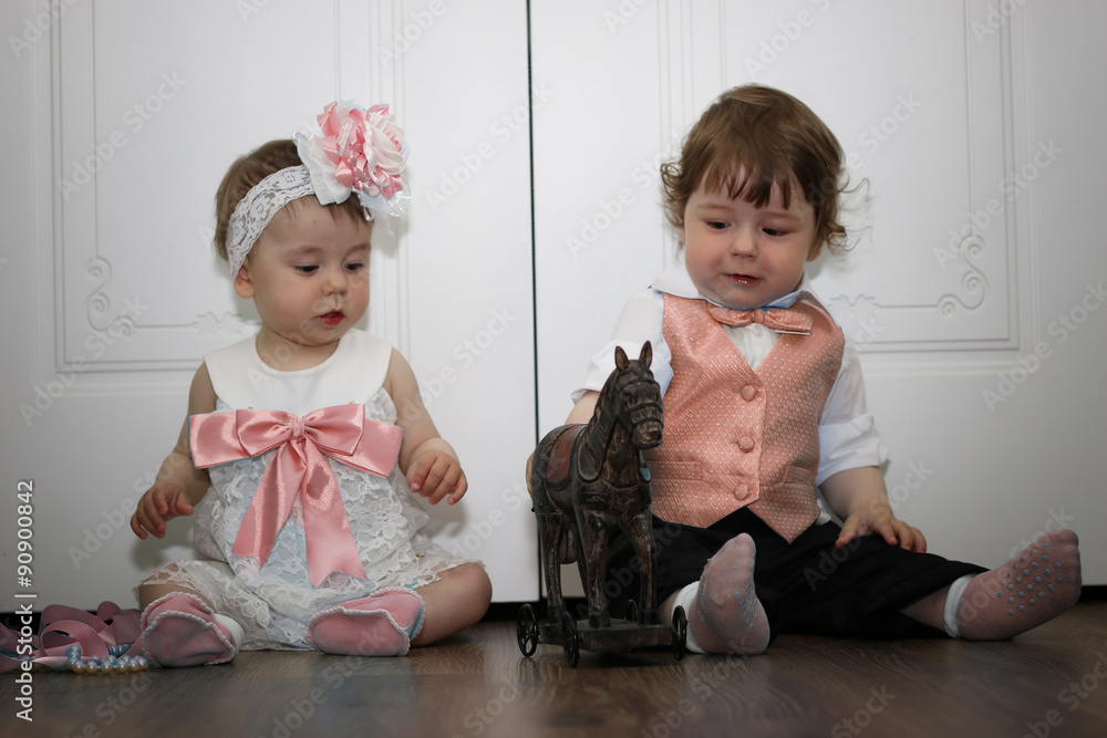 babies in the suit boy and girl twins