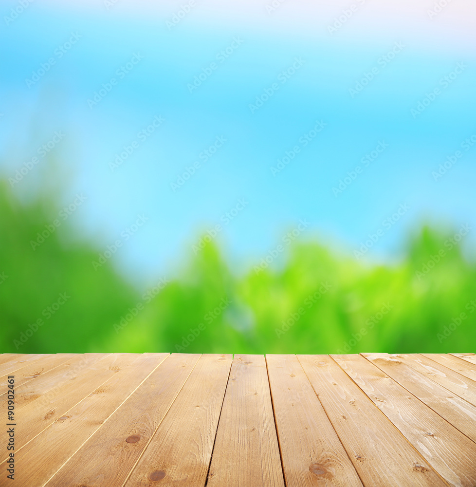Wooden table with abstract blur background Wooden table with abstract blur background