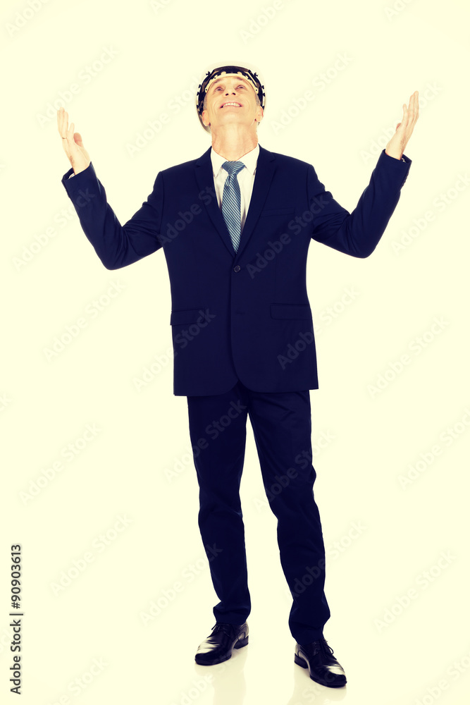 Smiling businessman with open arms up