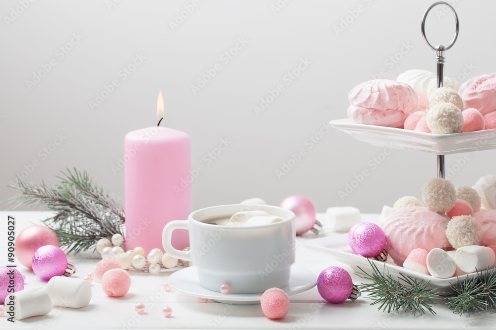 Christmas table with cup of coffee and dessert