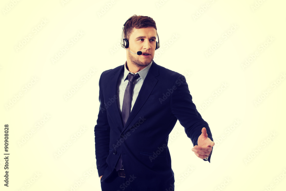 Call center man talking through phone. Call center man talking through phone.