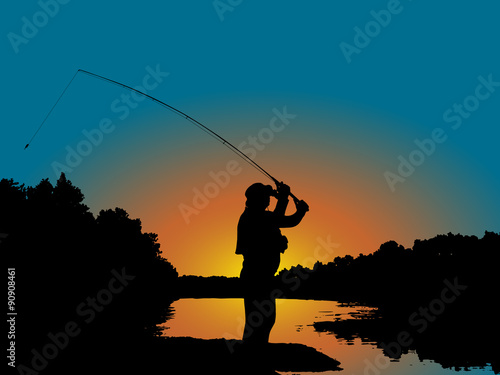 Fishing casting on the sunset from the coast