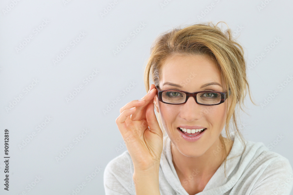 Portrait of smiling blind woman with eyeglasses, isolated Portrait of smiling blind woman with eyeglasses, isolated