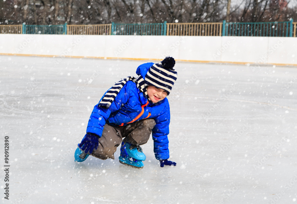 cute little boy learning to skate in winter cute little boy learning to skate in winter
