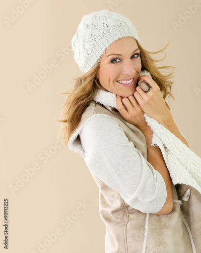 Attractive fashion woman with winter clothes, isolated