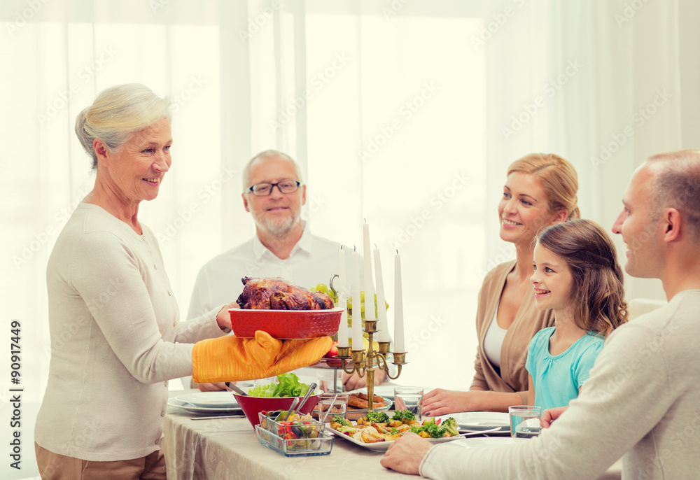 smiling family having holiday dinner at home smiling family having holiday dinner at home