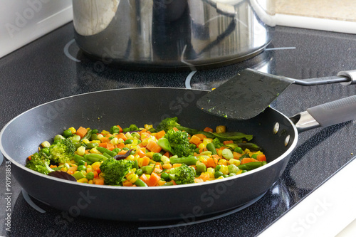 Vegetables mix on frying pan. photo