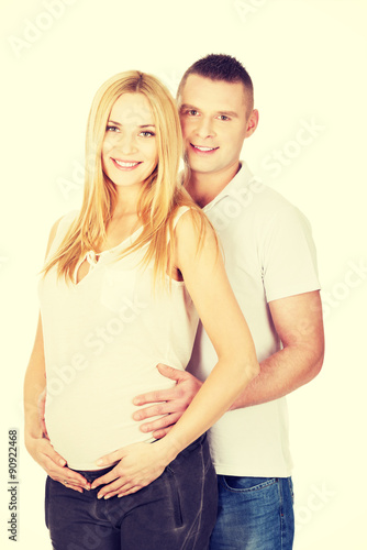 Beautiful young couple expecting baby