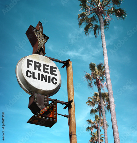 aged and worn vintage photo of medical clinic sign