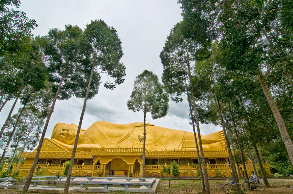 Huge lying Buddha statue at Khmer pagoda in Tra Vinh province, Vietnam Huge lying Buddha statue at Khmer pagoda in Tra Vinh province, Vietnam